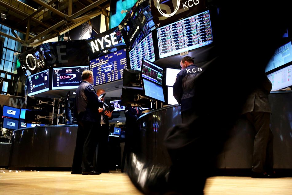 NEW YORK, NY – OCTOBER 30: Traders work on the floor of the New York Stock Exchange at the end of the trading day on October 30, 2013 in New York City. In a highly expected move, the Central bank has decided to keep buying $85 billion in bonds each month. The Dow Jones industrial […]