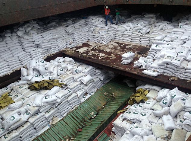 Bags labeled “Cuban Raw Sugar” are seen inside a North Korean flagged ship “Chong Chon Gang” docked at the Manzanillo Container Terminal in Colon City July 16, 2013. Panama detained a North Korean-flagged ship from Cuba as it headed to the Panama Canal and said it was hiding weapons in brown sugar containers, sparking a […]
